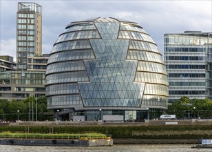 Modern architecture of City Hall building, Southwark, London, England, UK architect Norman Foster