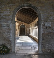 Cloister with tombs, church Chiesa di San Michele in Isola, cemetery island of San Michele, Venice,