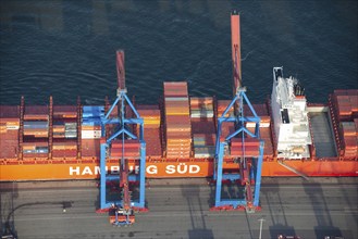 Aerial view of the container ship of the shipping company Hamburg Süd the Santa Teresa at the