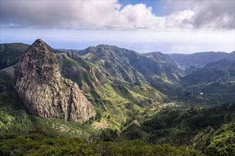 View of the Roque de Agando rock tower from the Mirador del Morro de Agando. To the right is the