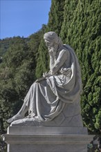 Sculpture with plaque in front of the Pantheon in the Staglieno Monumental Cemetery, Cimitero