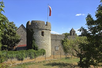 Historic spot wall with defence defence tower in Flörsheim-Dalsheim, Monsheim, Rhine-Hesse region,