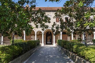 Cloister with tombs, church Chiesa di San Michele in Isola, cemetery island of San Michele, Venice,