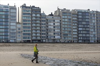 High-rise buildings, woman, beach, Westende, Middelkerke, Belgium, Europe