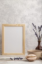 White wooden frame mockup with lavender in ceramic vase, linen textile, cup of coffee and bun on