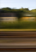 Long exposure from a moving train, Minden, North Rhine-Westphalia, Germany, Europe