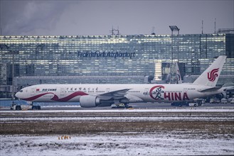 Aircraft on the taxiway at Frankfurt FRA airport, Fraport, in winter, Hesse, Germany, Europe