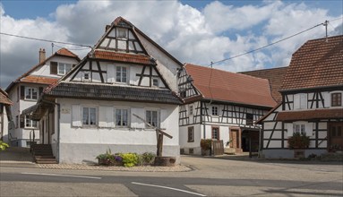 Main street with half-timbered houses and fountain, Alsace, Bas-Rhin, Grand Est, France, Europe