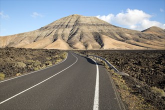 Road leading towards Montana de Medio, mountain, Los Ajaches mountain range, Lanzarote, Canary