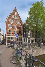 Bridge over Oudezijds Voorburgwal canal with Het Wapen van Riga merchant's house, Amsterdam,