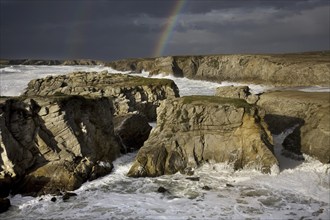 Rainbow during storm at sea, Côte Sauvage, Quiberon, Brittany, France, Europe