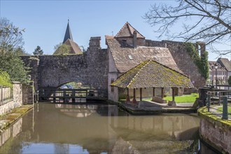 Le Bruch, old town wall with weir and historic wash house on the Lauter, Wissembourg, Northern