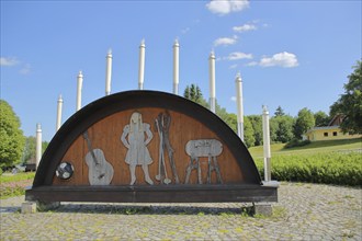 Traditional candle arch with lights as a symbol of historical manufacture and production of musical