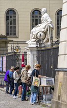 Tourists at the flea market stall in front of Humboldt University, Unter den Linden, Berlin,