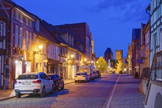 The Lange Straße with half-timbered houses and other old buildings, covered with cobblestones,