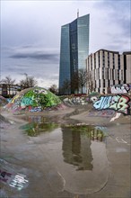 Building of the European Central Bank, ECB, skate park in the rain, at the Osthafen, at the Main in