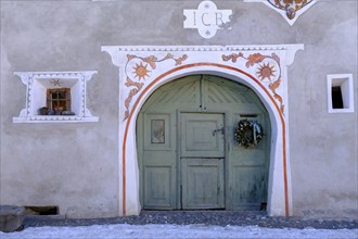 Entrance doors, sgraffito in the house walls, Scuol, Engadin, Graubünden, Switzerland, Europe