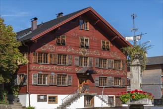 Schwarzenberg, village square with fountain, historic inn from 1765, facade, inscription, Bregenz