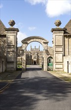 Stone archway entrance to Corsham Court, Wiltshire, England, UK