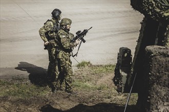 Armed soldiers, photographed as part of a Bundeswehr exercise with armed forces from Norway and the