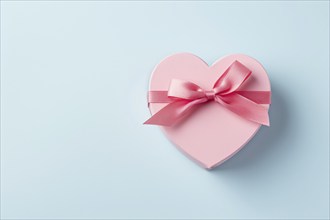 Single pink heart shaped gift box on pastel pink background. KI generiert, generiert, AI generated