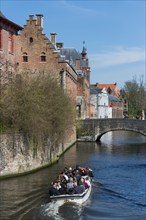 Tourist boat in the city canal, UNESCO, cityscape, tourism, travel, Flanders, West Flanders,