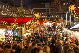 Christmas market at Roncalli Platz am Dom, in the city centre of Cologne, Sunday shopping in