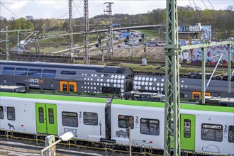 S-Bahn and regional express, Rhein-Ruhr-Express, RRX train on the railway line at the Kaiserberg