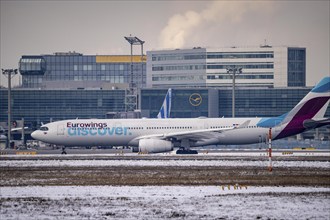 Eurowings Discover Airbus on the taxiway at Frankfurt FRA airport, Fraport, in winter, Hesse,