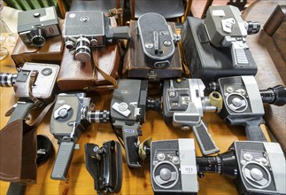 A collection of vintage cine film cameras on display at auction, UK