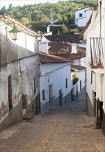 Traditional housing street village of Fuenteheridos village, Sierra de Aracena, Huelva province,