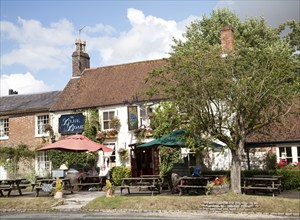 The historic Blue Boar pub on the village green in Aldbourne, Wiltshire, England, United Kingdom,