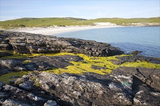 Rocky headland and sandy beach at Bagh a Deas, South Bay, Vatersay island, Barra, Outer Hebrides,