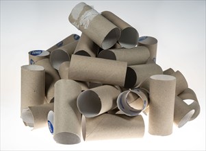 Pile, mountain of empty, used toilet paper rolls