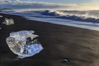 Ice floes on the beach, waves, sunny, morning mood, winter, Diamond Beach, Breidamerkursandur,