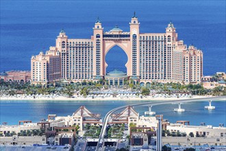 The Palm Jumeirah with Atlantis Hotel artificial island from above in Dubai, United Arab Emirates,