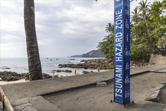 Tsunami Hazard Zone. Warning sign, signposting of escape routes in the event of another seaquake.