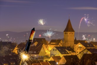 Photomontage, Ignited rocket, fireworks on New Year's Eve, view of Korb-Steinreinach in the Rems