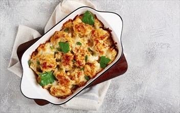 Baked cauliflower, in cream sauce, with cheese and spices, homemade, no people