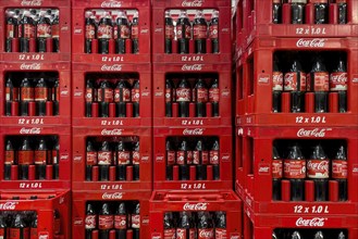 1 litre bottles of sugary drink Coca Cola, Germany, stacked in crates, Europe