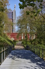 Tower of Nordstern colliery with the statue of Hercules from the Tausendfüsserbrücke bridge in