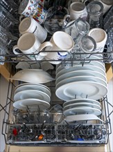 Dishwasher, full of clean crockery