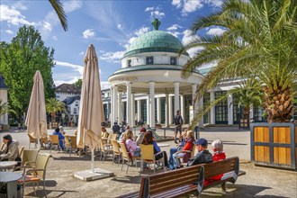 Street café on the Brunnenhof with spring temple and Wandelhalle, spa town of Bad Pyrmont, Lower