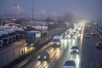 Heavy traffic on the A2 at the Bottrop-Süd service area, overcrowded lorry parking in the evening,