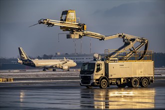 Winter at Frankfurt Main Airport, FRA, de-icing vehicles waiting for aircraft to be de-iced, Hesse,