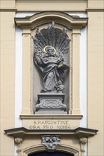 Figure of St Augustine in a niche above the entrance portal of St Augustine's Church,