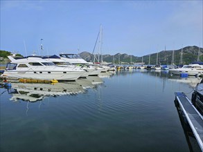 Marina with several boats, surrounded by Bergen, Sandnes, Fylke Rogaland, Norway, Europe