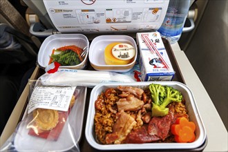 Aeroplane meal in the COMAC C919 aircraft of China Eastern with the registration number B-919F at