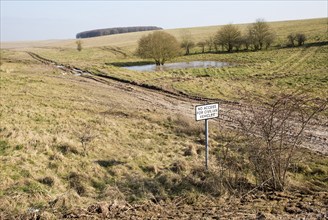 Chalk landscape scenery near Chitterne, Salisbury Plain, Wiltshire, England, UK sign no access for