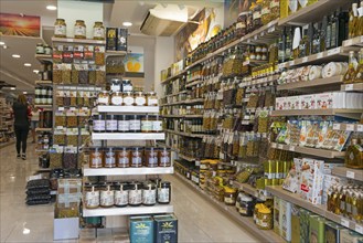 View into a grocery shop with well-stocked shelves full of products, Ouranoupoli, City of Heaven,